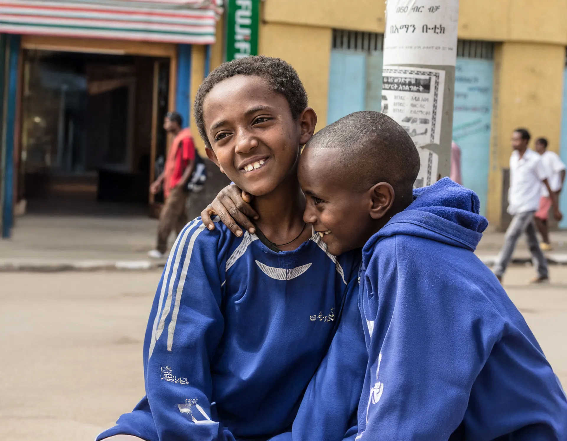 Desta can now buy textbooks for her children with a money transfer from her husband working in New Zealand