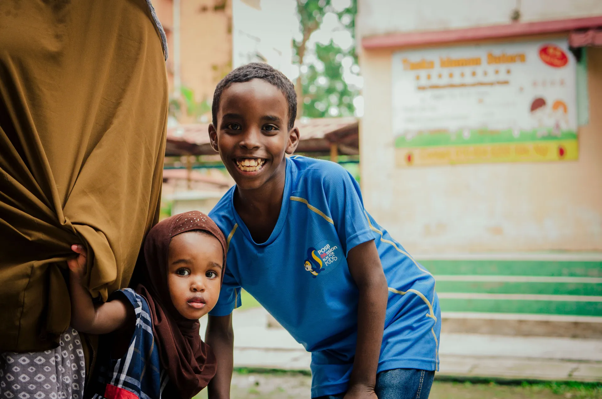 Yuusuf sends money to his younger brother to help set up a soccer hub in their village